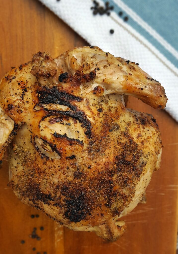 An air fried "rotisserie"chicken is crisp on the outside and tender and juicy on the inside.