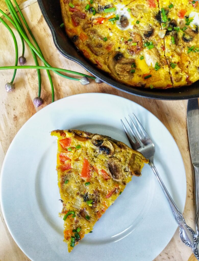 Fluffy eggs, savory sausage and a blend of healthy vegetables come together in this low carb Whole30 Italian Sausage Frittata.