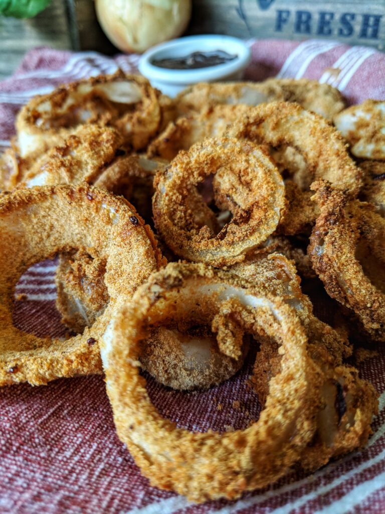 These incredibly crispy gluten and dairy free onion rings are soaked in coconut milk before being being battered and air fried to perfection.