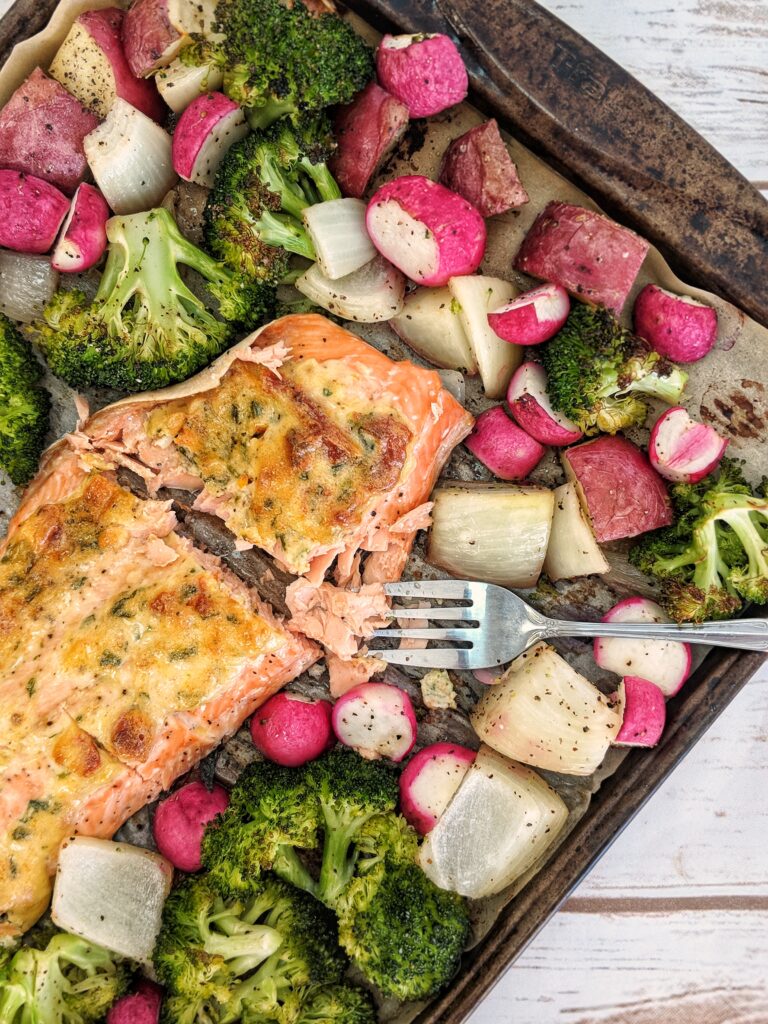 Moist and flaky salmon fillet is coated in a delicious sun-dried tomato aioli and surrounded by a healthy medley of seasonal vegetables.
