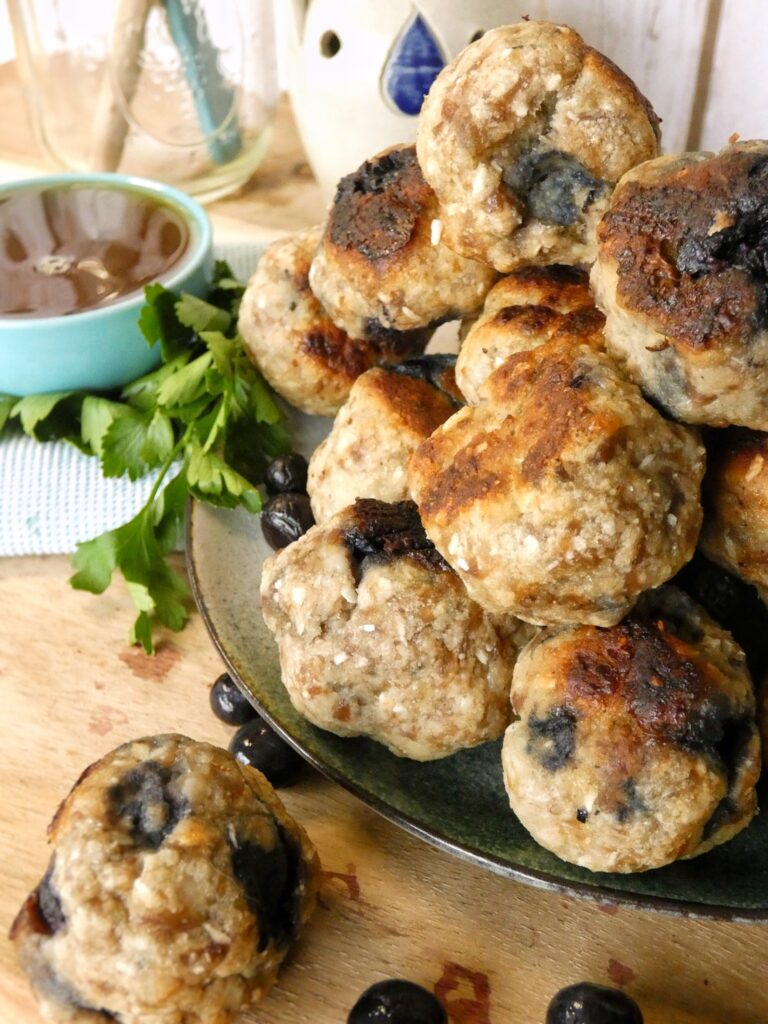 These gluten-free. dairy-free and Paleo meatballs encompass the sweet flavor of blueberry pancakes and the savory flavor of breakfast sausage all in one bite!