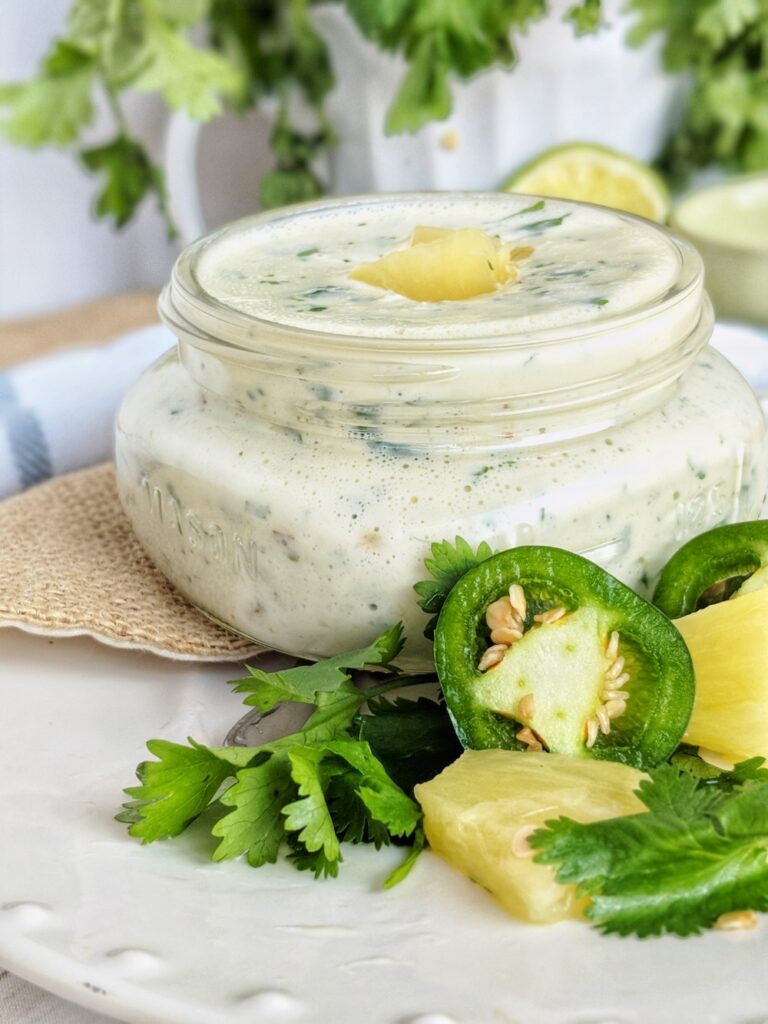 Creamy Jalapeno Pineapple Aioli is made by simply adding a handful of fresh and flavorful ingredients like jalapeno, pineapple, cilantro and garlic to any basic mayonnaise. This Whole30/Paleo sauce is a great condiment to have in your fridge!