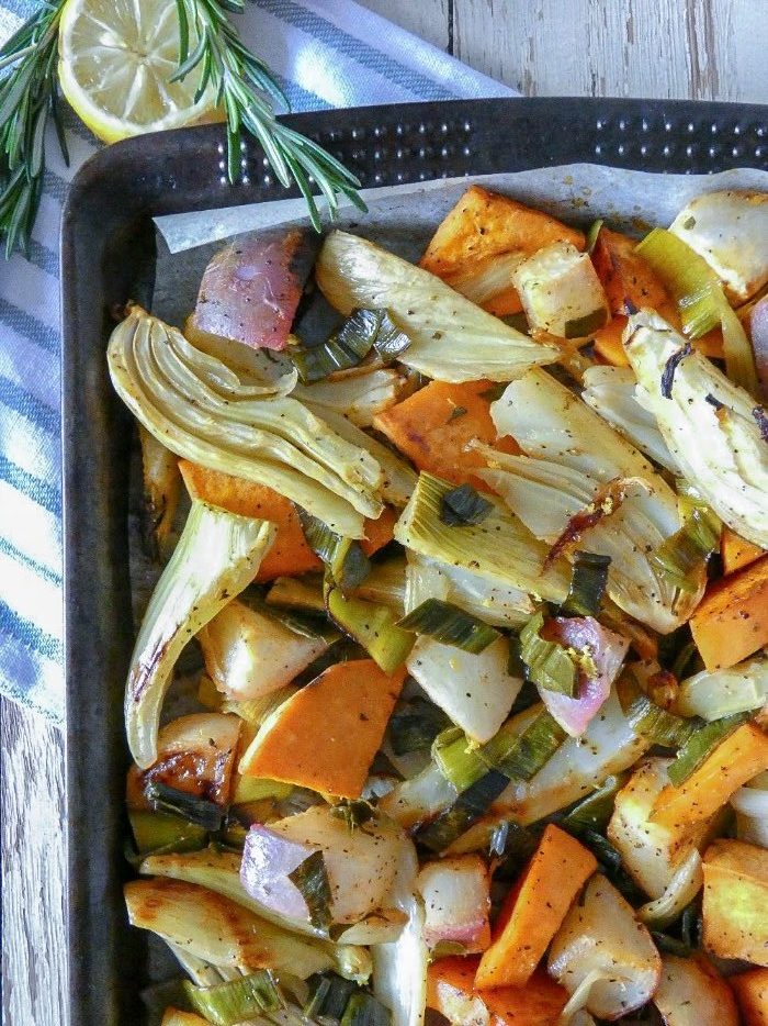 This colorful, healthy sheet pan of roasted vegetables features fennel, turnips, sweet potatoes and leeks. Made with Paleo and Whole30 compliant ingredients, this medley of vegetables is great as a simple weeknight side dish or as an addition to your holiday table.