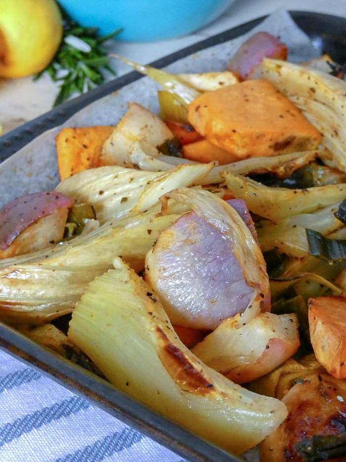 Root vegetables flavored with lemon and fresh herbs get roasted in a 425 degree oven making a super simple Paleo side dish for the holidays.